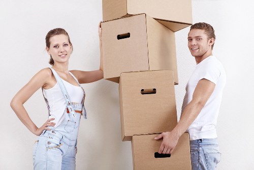 Professional movers loading furniture for local removals in Croydon