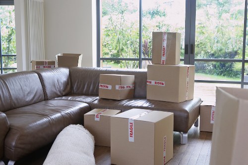 Packing and loading items into a removals van for a local move